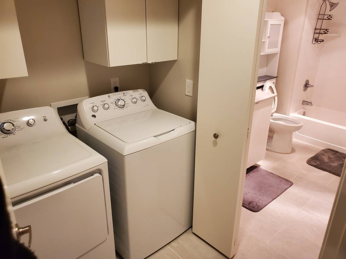 Bathroom with in-unit washer and dryer - 26 Bayside Ct