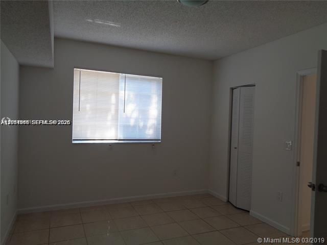 Building Photo - 3271 Sabal Palm Manor