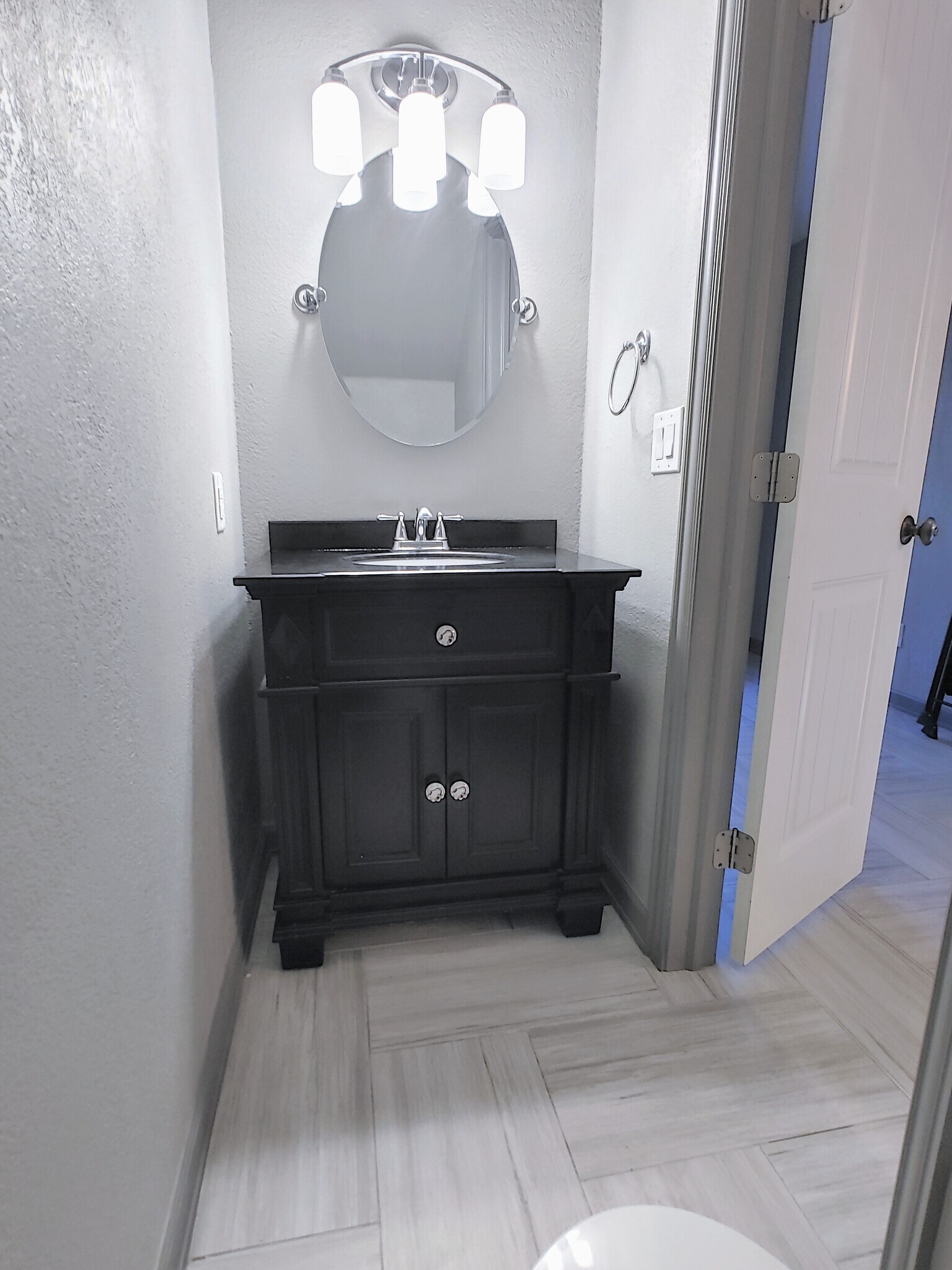 Half bath with elegant cabinetry - 2 Arnica Ct