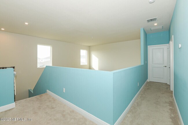 Building Photo - 10976 SW Tessili Wy
