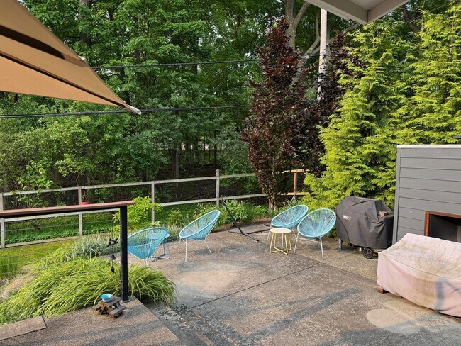 Building Photo - large modern home with big backyard, peace...
