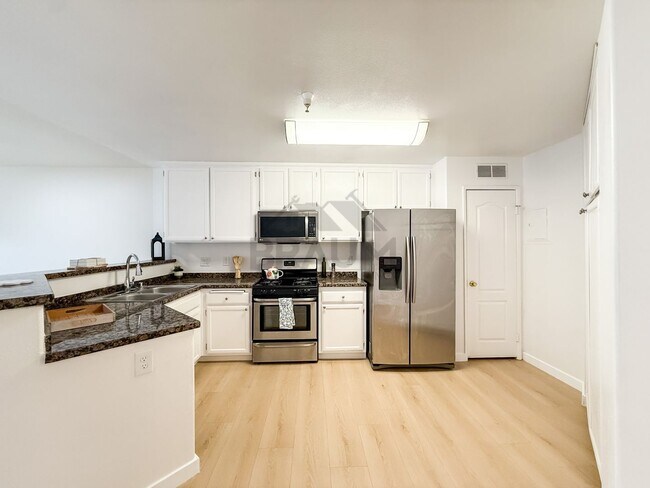 Building Photo - 7323 Winnetka Ave