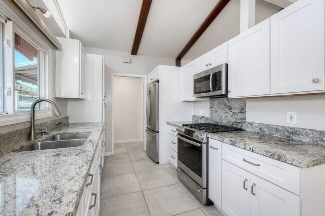 Building Photo - San Diego- Near Del Cerro - Refreshed 4 bed / 2 bath Home w/Solar ,A/C, Large Yard, Garage, and M...