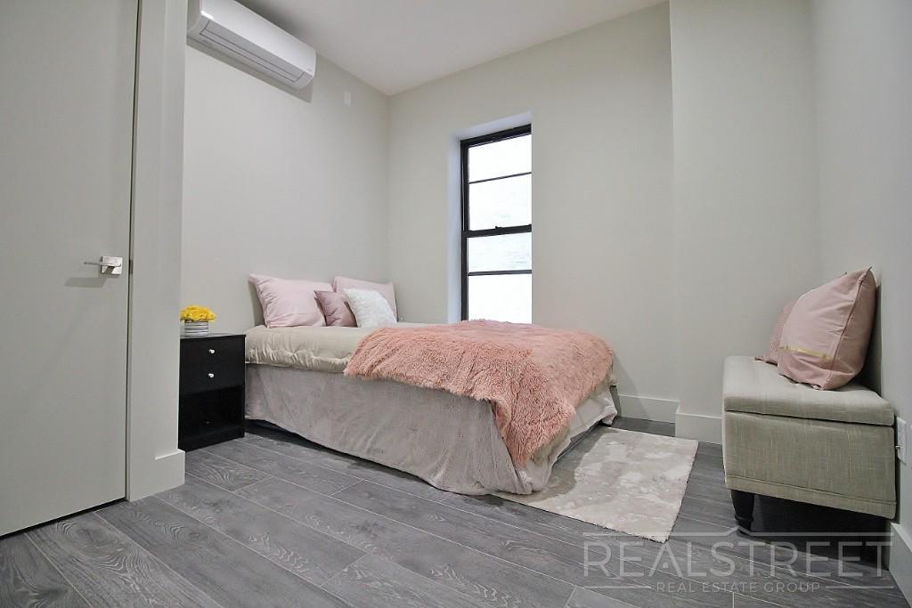 Building Photo - Spacious 2BR w/ Laundry, Pets OK, Backyard & Lounge | Steps to Brower Park & 3/4/C Trains