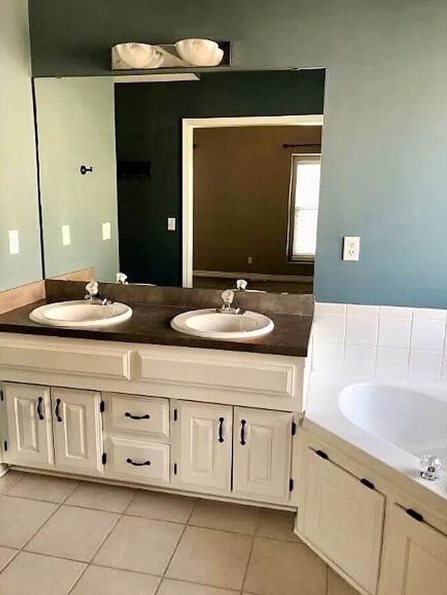 Building Photo - Spacious 4-Bedroom Greenwood Home with Vau...