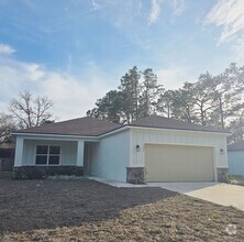 Building Photo - Brand New & Beautiful 3/2/2 in Citrus Spri...