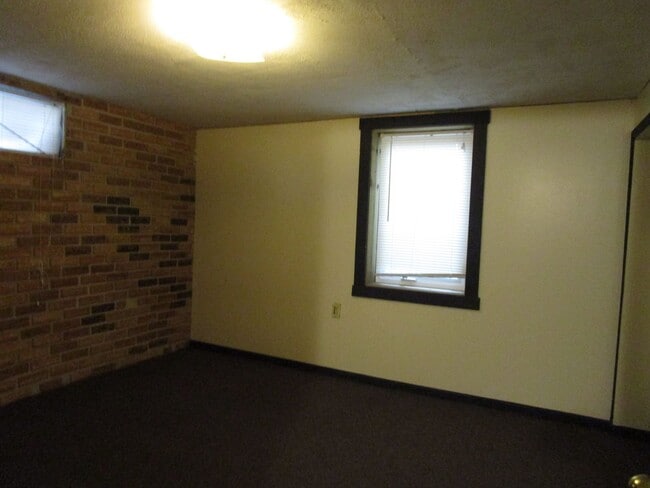 Building Photo - Privacy Fence and a Garage!