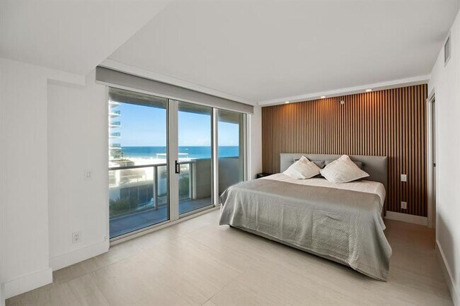 Building Photo - 9499 Collins Ave