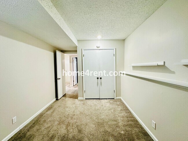 Building Photo - A Lovely Four Bedroom Home in Lenexa w/ Wood Floors, Finished Basement and a Fenced Yard!