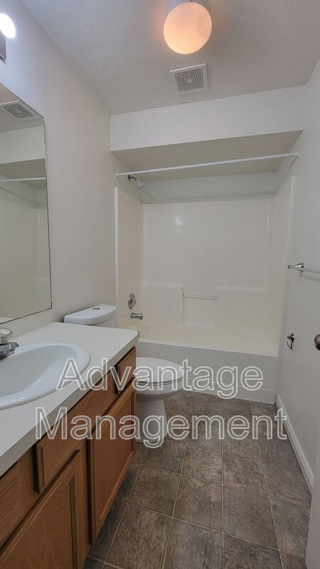 Building Photo - 8083 N Ridge Loop E
