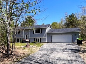 Building Photo - Bright, Spacious, and Surrounded by Nature