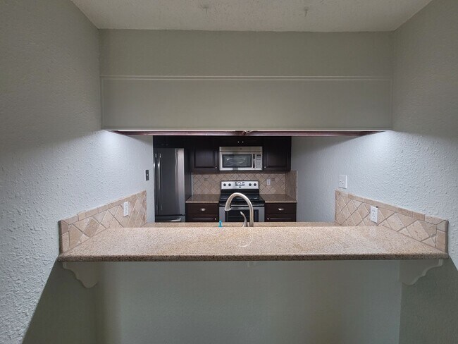 Building Photo - 7079 N Holiday