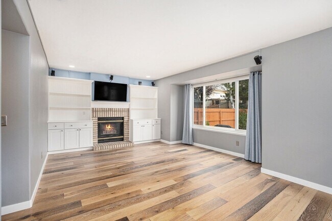 Building Photo - Spacious 4-Bedroom Home in District 20 with Huge Deck & Fenced Yard