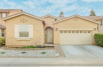 Building Photo - Lovely 3 Bedroom Low Maintenance Unit with New Flooring!