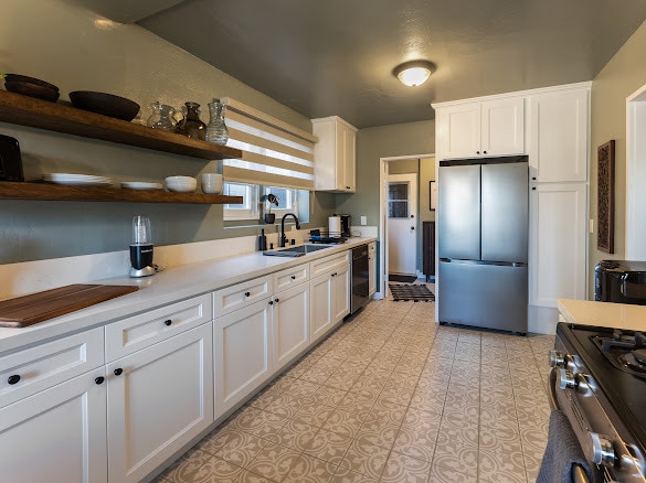 Gourmet kitchen, back storage and exit - 1442 S Burnside Ave