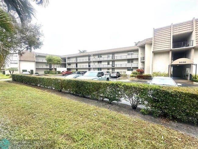 Building Photo - 9330 Lime Bay Blvd