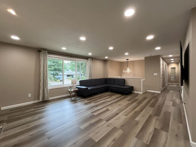 Building Photo - Three-Bedroom Home Near Nike Campus with Bonus Room, Large Deck & Two-Car Garage