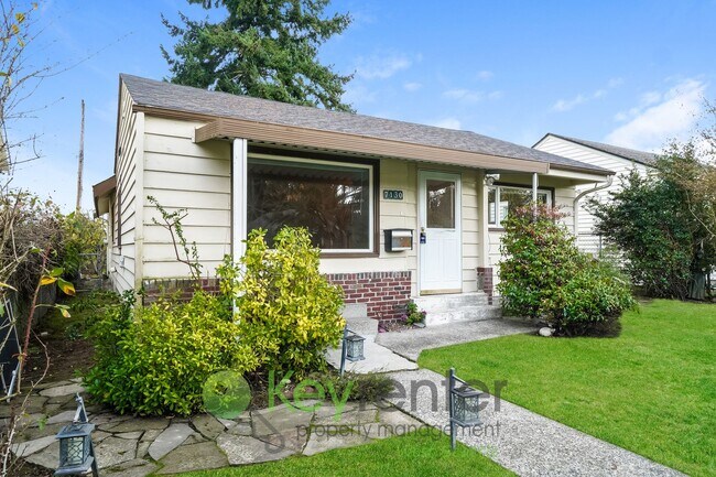 Primary Photo - Stylish Three Bedroom Retreat with fully fenced yard and storage!