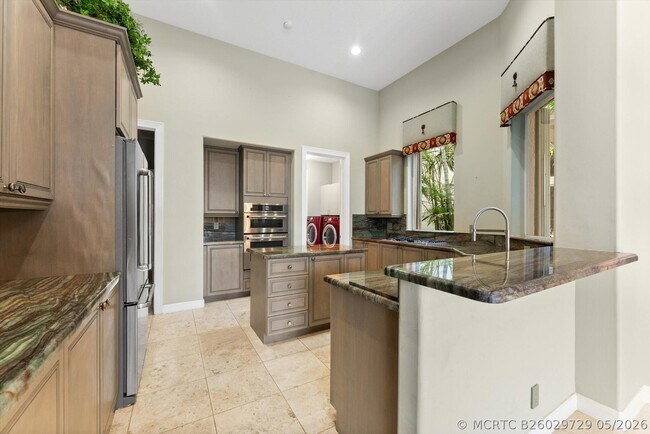 Building Photo - 7081 Mallorca Crescent