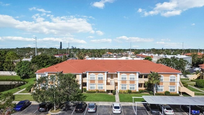 Building Photo - Spacious 1-Bedroom Condo for Annual Rent available now in gated Villagio Community