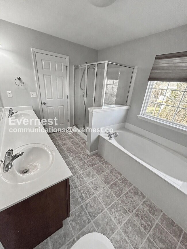 Building Photo - Spacious 4-Bed Home with 2-Car Garage & Modern Amenities