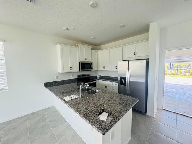 Building Photo - 3156 Gardenia Reserve St