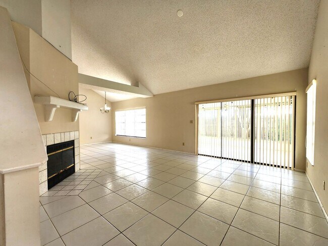 Building Photo - Open Layout; Fenced-in Yard; Quiet Neighbo...