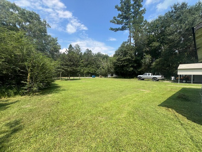 Building Photo - 8206 Sunflower Dr