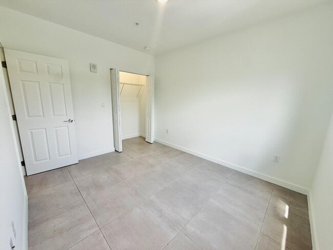 Building Photo - 1295 W 69th St