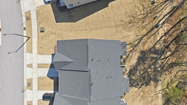 Building Photo - Upgraded 3BR Townhome in Wake Forest | Open Layout, Garage & Resort-Style Amenities