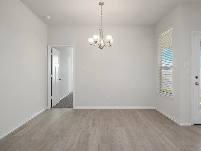 Building Photo - 3 Bedroom 2 bath, 2 garage attached garage with all the appliances to include washer & dryer