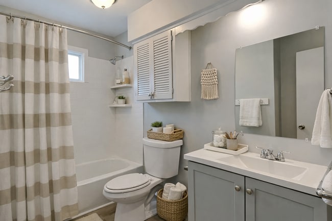 Building Photo - Spacious 4BR Home with Finished Basement, Fireplace & Unique Layout