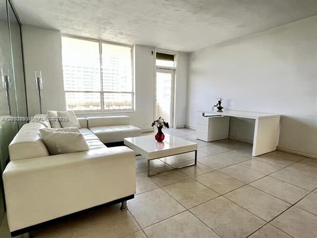 Building Photo - 10185 Collins Ave