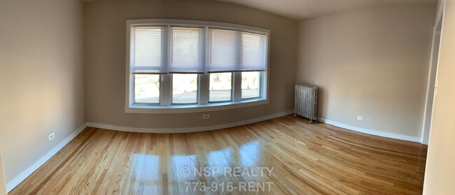 Building Photo - 5662 N Ridge Ave