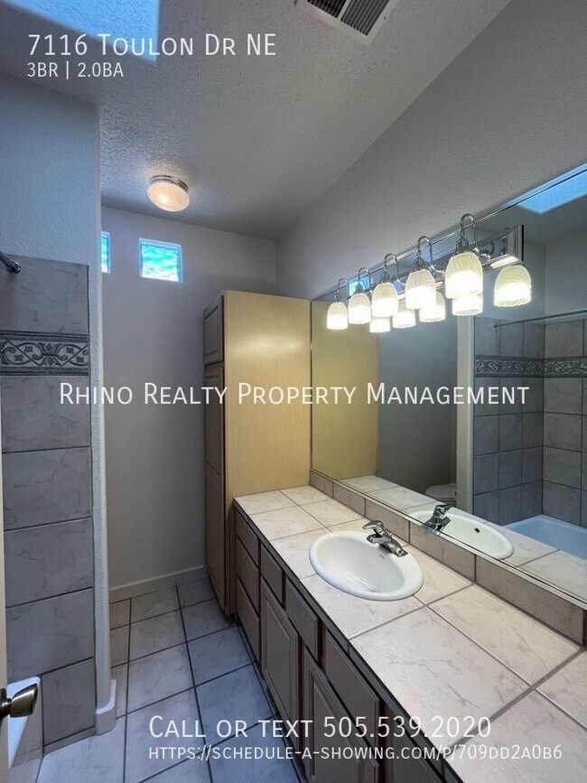 Building Photo - 7116 Toulon Dr NE