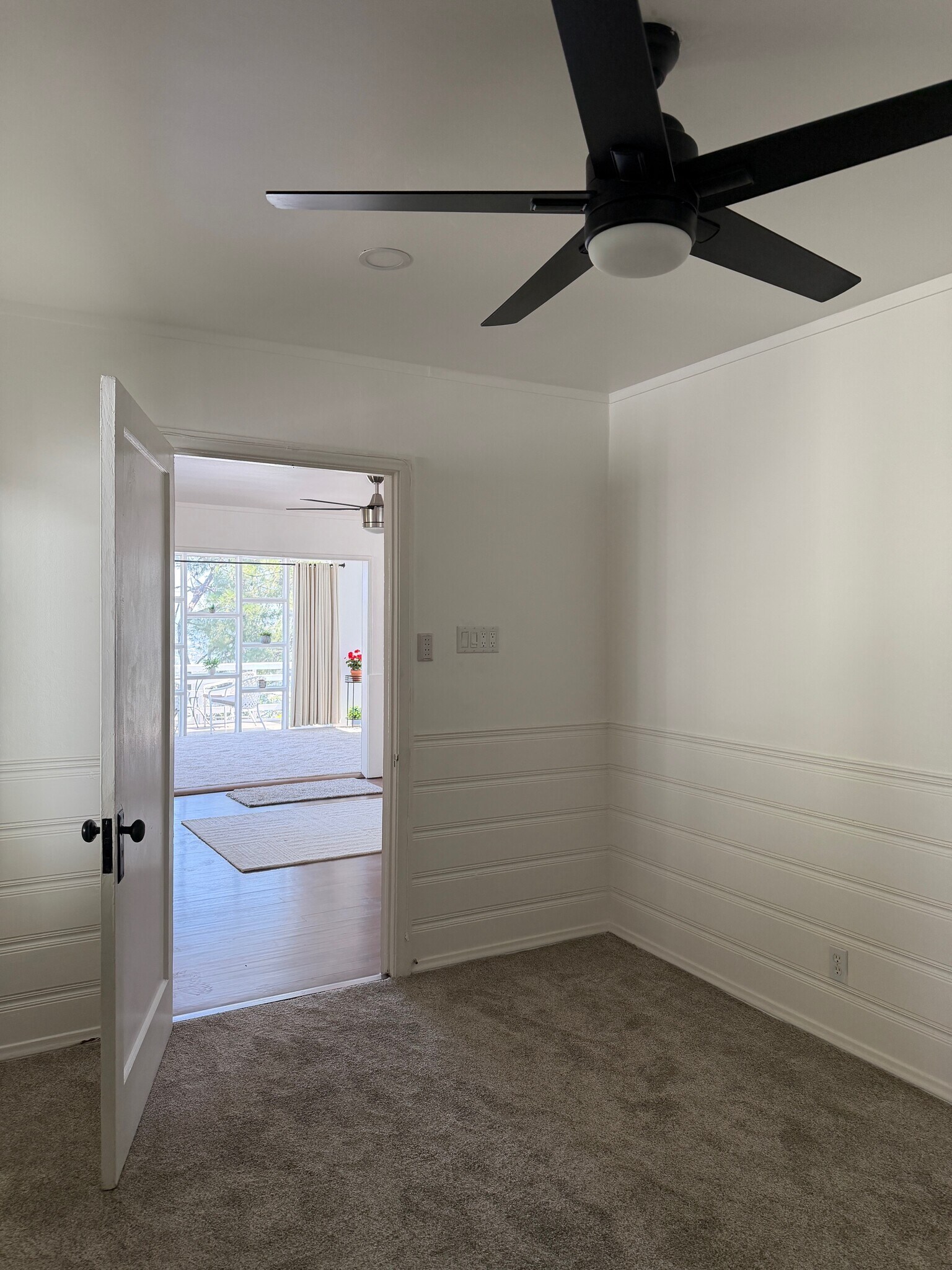 Bedroom with fan - 518 1/2 Crane Blvd