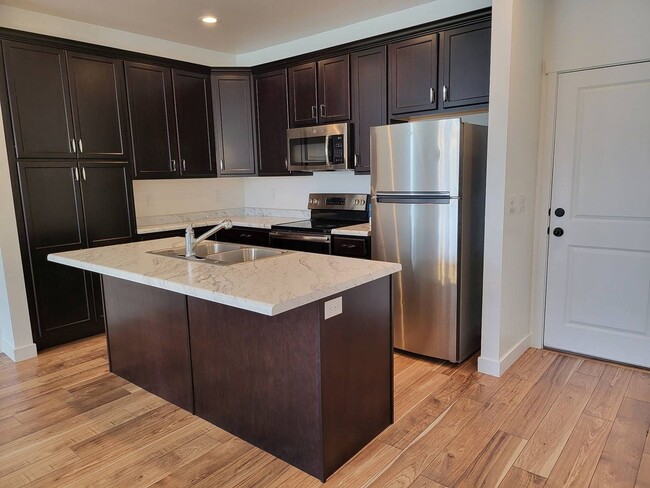 Building Photo - Pet Friendly Gorgeous Row End Townhome w 2 car attached garage!