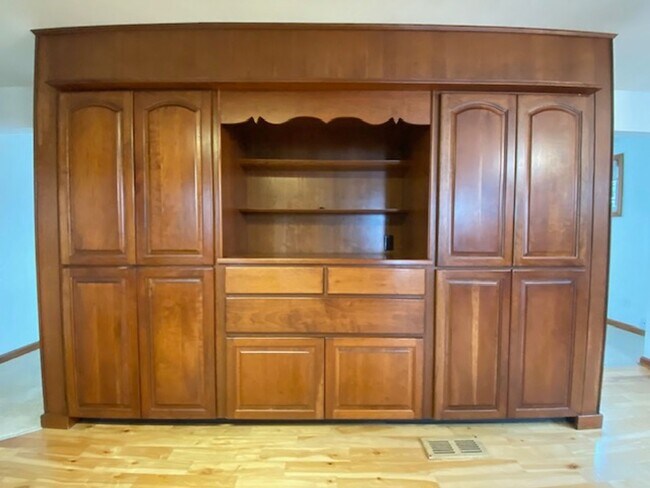 Building Photo - Welcome to this charming three-bedroom, tw...