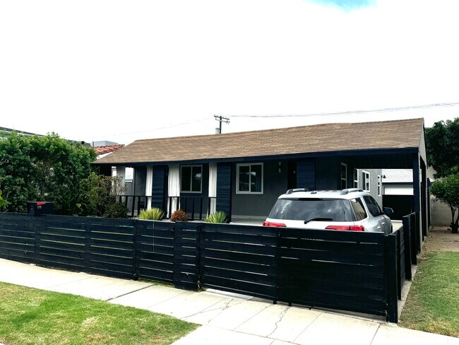 Exterior was recently painted grey / black. - 1711 S Ridgeley Dr