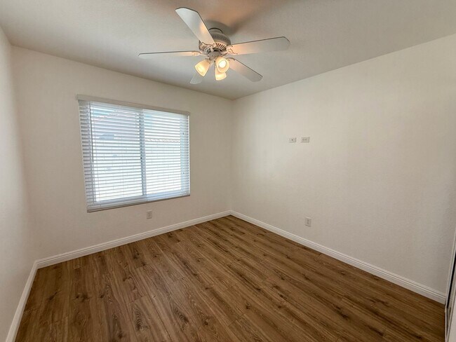Building Photo - Corner Lot Beauty with Open Living, Guest Suite Down & Expansive Backyard