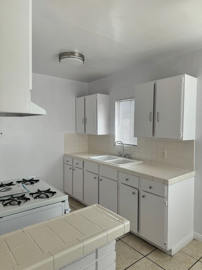 Building Photo - 1 BDRM, 1 BA WITH PARKING (PICTURES COMING...