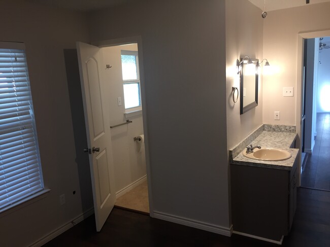 Vanity and bathroom from bedroom - 1119 10th St.