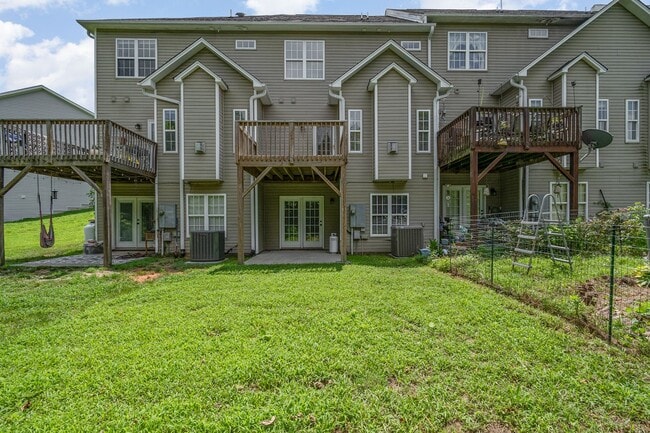 Building Photo - Spacious 2-Story Townhome with Finished Ba...