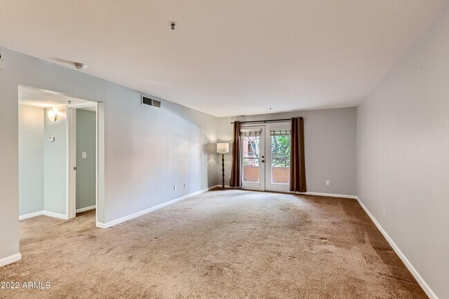 Living Room - 4704 E Paradise Village Pky N