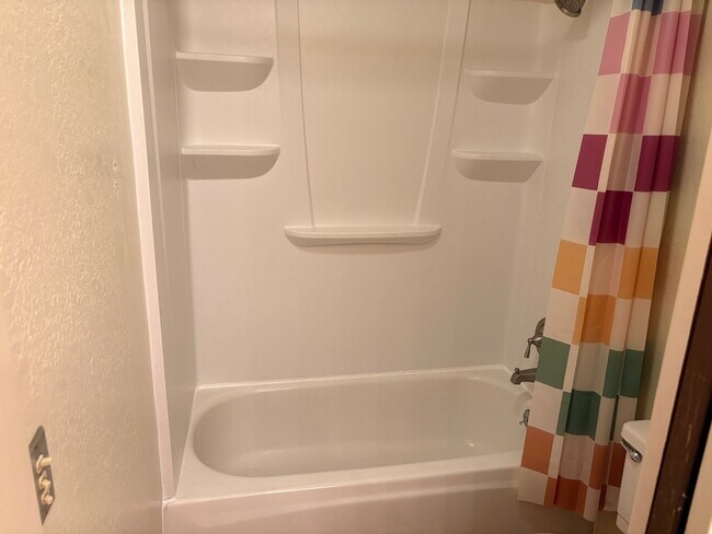 Building Photo - 2 bedroom plus loft condo with carport