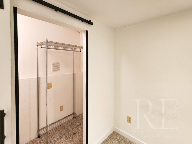 Building Photo - Vaulted Ceilings, Unique Designer Kitchen & Expansive Half-Acre Setting with Flexible Living Spaces