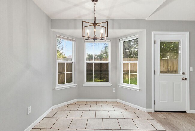 Building Photo - This beautiful ranch-style home