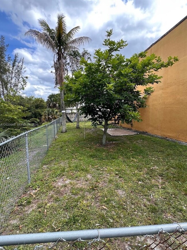 Building Photo - 5950 NW 25th Pl