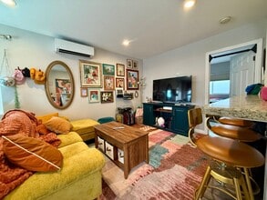 Building Photo - Modern Bungalow with W/D + A/C! Assigned Parking Included & 1 Garage Storage!
