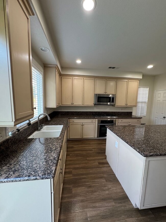 Building Photo - Stunning Home in a Desirable Gated Community